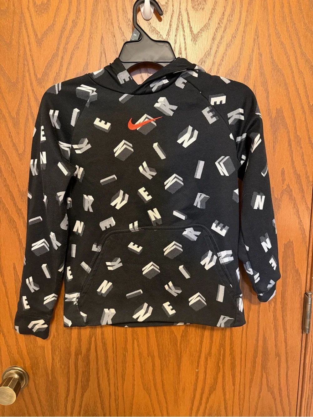 Boys Nike Black Hoodie with White Letter Print and Red Swoosh